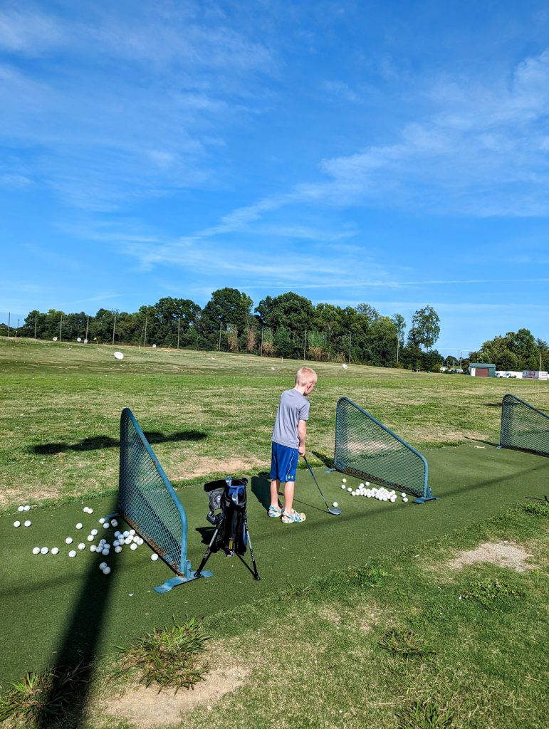 THE DRIVING RANGE IS A HIT WITH THE KIDS.