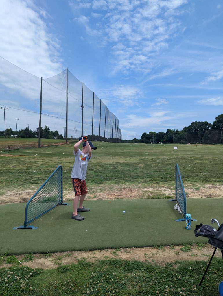 THE DRIVING RANGE IS A HIT WITH THE KIDS.